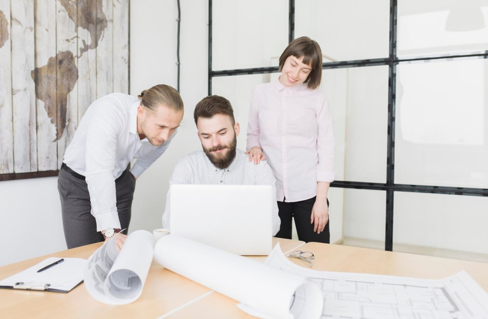 Person reviewing financial documents with focused attention